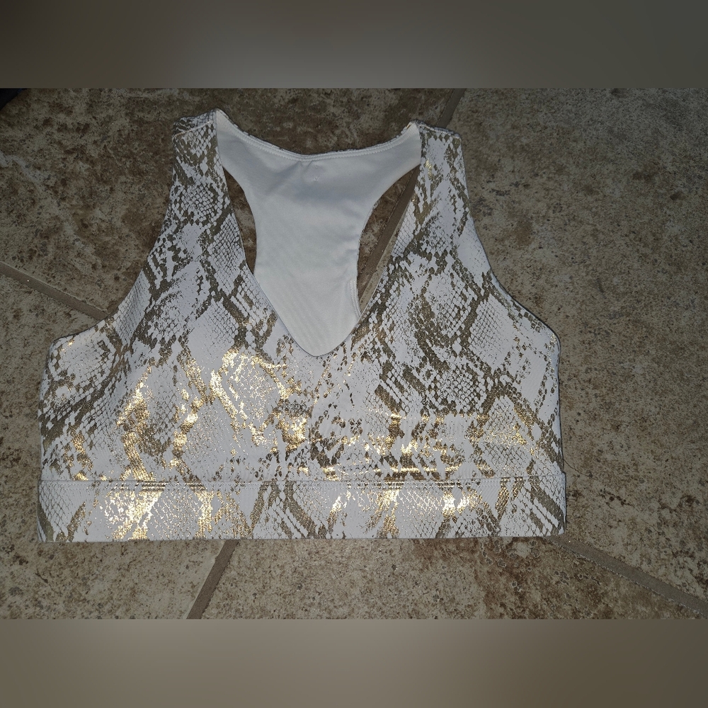 Fabletics On-The-Go Midi Medium Impact Sports Bra- Gold Foil